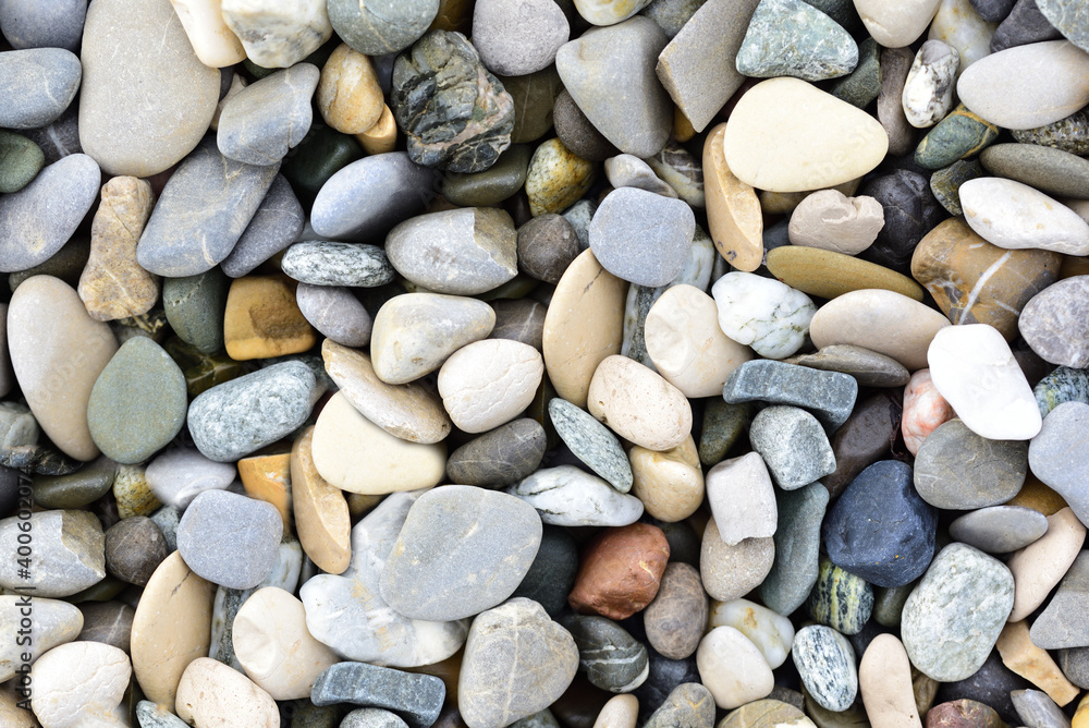 Background and texture of pebbles lying next to each other Background and texture of pebbles lying next to each other