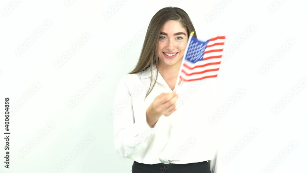 blonde woman waving in front of United States
flag blonde woman waving in front of United States
flag