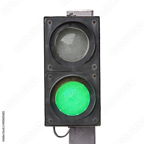 Two-color traffic light with green light on it isolated