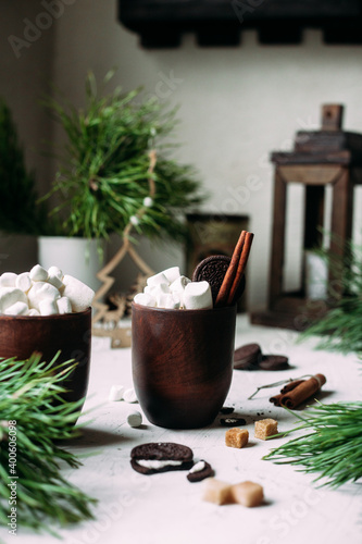 Cocoa with marshmallows in a glass on a New Year's table