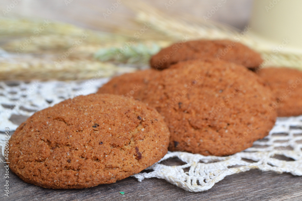 Homemade oatmeal cookies on rustic background close up Homemade oatmeal cookies on rustic background close up