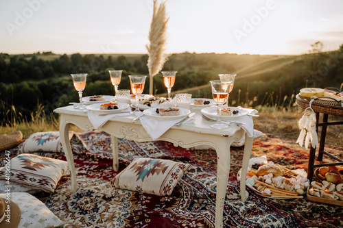 Snacks and Drink Glasses on Picnic Vintage Table