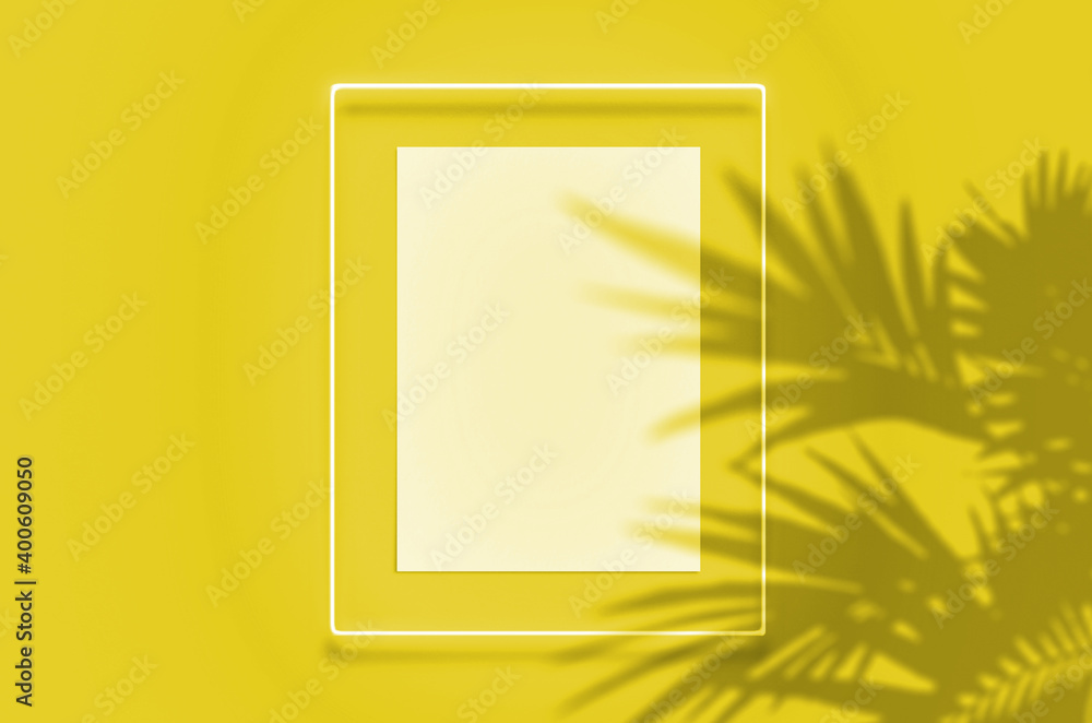 Mockup poster in a neon frame with a yellow glow. Illuminating Pantone  Color Of The Year 2021. Scene with tropical overlay palm shadows with free  space inside Stock Photo | Adobe Stock