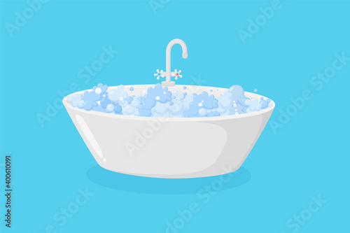 Bathtub with suds and faucet. Luxury ellipse tub with tap with soap foam isolated in blue background. Vector illustration in cartoon style