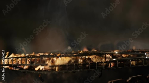 the process of cooking marinated meat on the grill