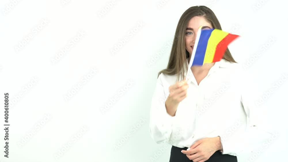 blonde woman waving in front of romania flag blonde woman waving in front of romania flag