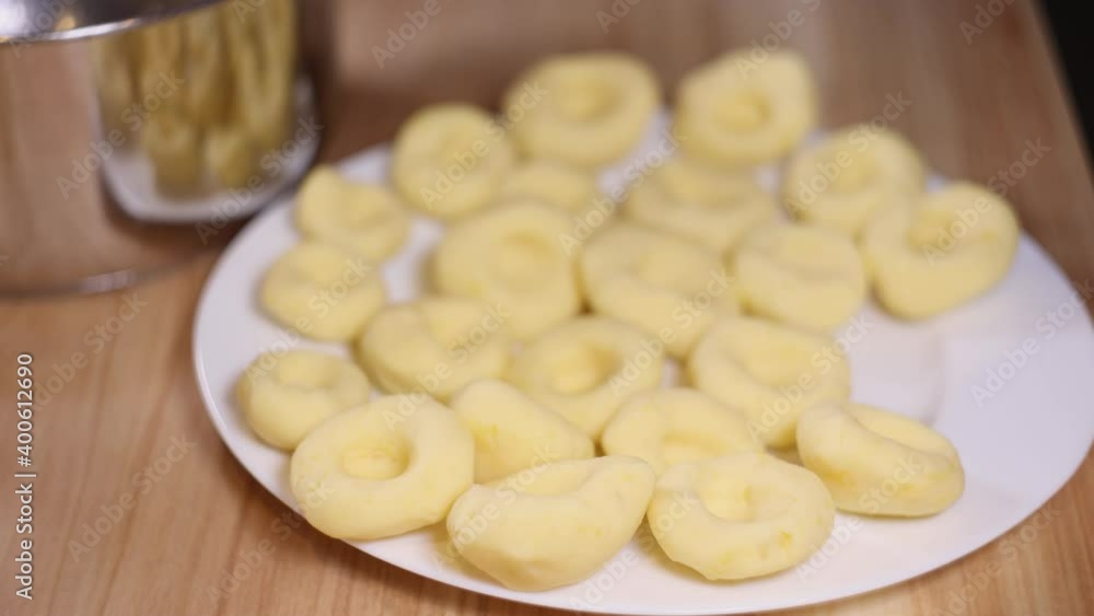 Person preparing silesia noodles in the kitchen. Person preparing silesia noodles in the kitchen.