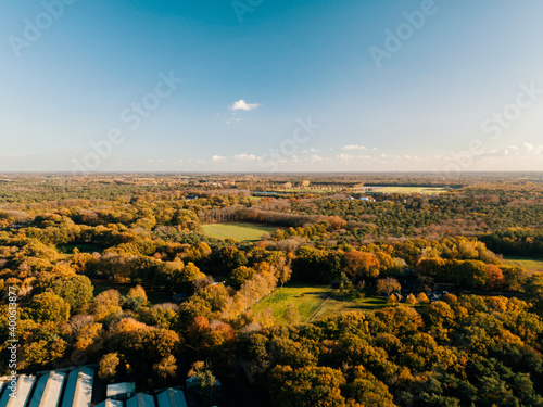 Fototapeta Naklejka Na Ścianę i Meble -  Aerial drone shot of the flat landscape of the Netherlands.