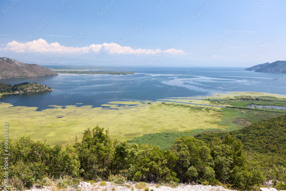 Panorama of the Skadar lake with mountains around. Skadarsko jezero is a national park in Montenegro, Europe