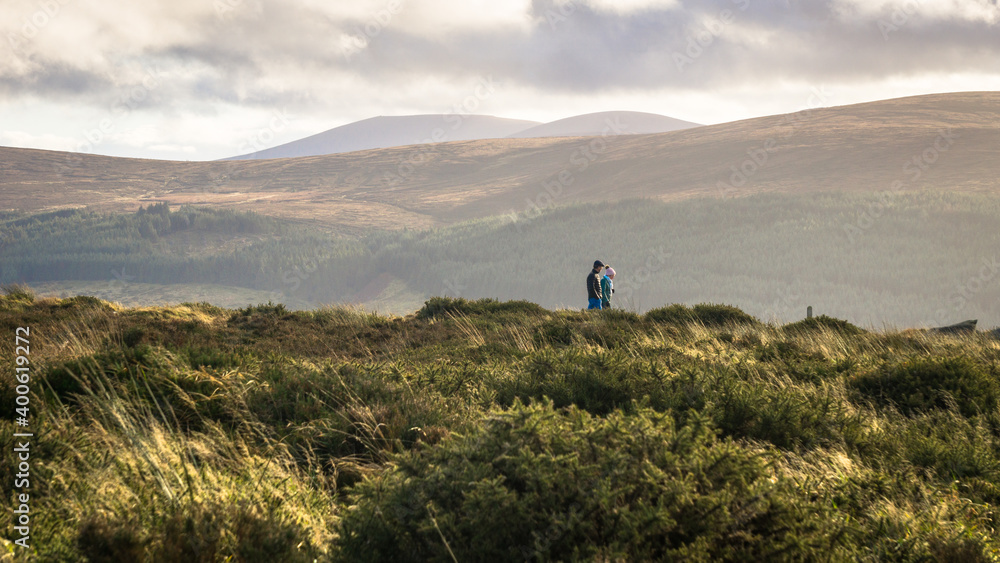 Fototapeta premium Couple walking in the Dublin Mountains
