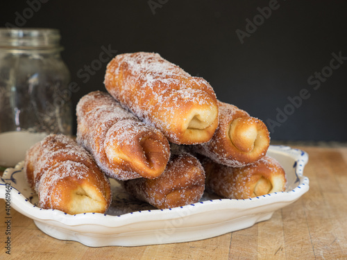 Typical Catalan pastry, (xuxo de crema) filled with custard. photo