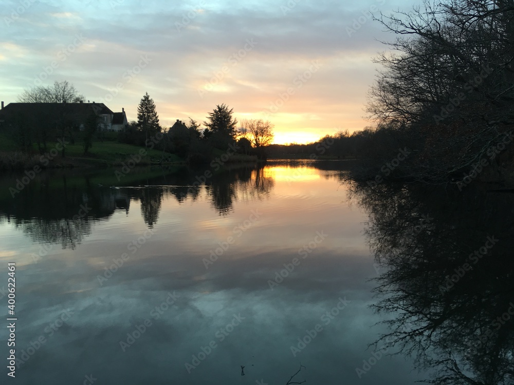 Fototapeta premium sunset over the river