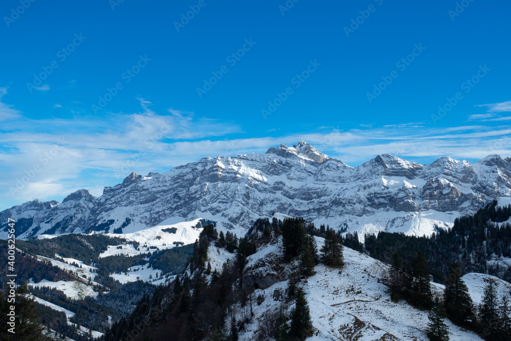 View over the hills of Appenzell to Saentis, a famous Swiss mountain