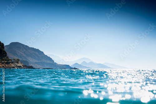 Blue sea with mountains