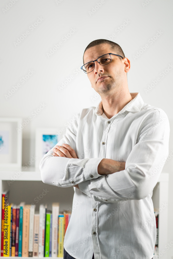 Waist up face portrait head shot of adult caucasian man short hair wearing eyeglasses looking to the camera indoor front view copy space Waist up face portrait head shot of adult caucasian man short hair wearing eyeglasses looking to the camera indoor front view copy space