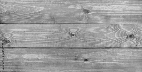 wooden natural background from several layers, wooden texture, gray color photo