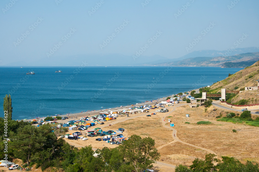 Camping by the sea in Crimea on a summer day