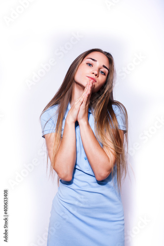 young pretty teenage hipster girl posing emotional happy smiling on white background, lifestyle people concept © iordani