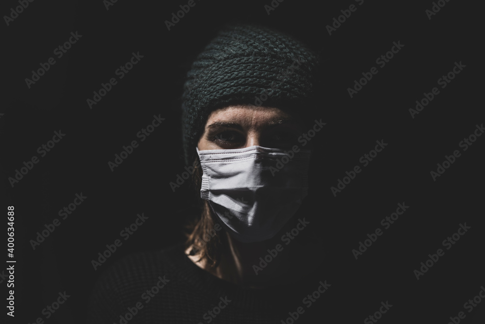 a woman protected from coronavirus with a mask