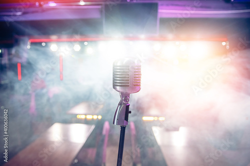 Photography Close-up old retro vintage microphone on blurred stand up smoke background conce