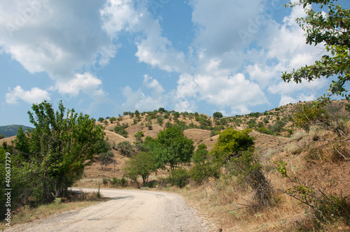 Landscape with mountains and a road in Crimea on a sunny day