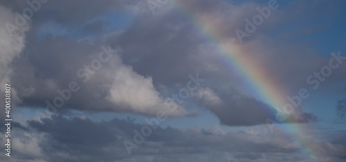Clouds with raimbow in the sky