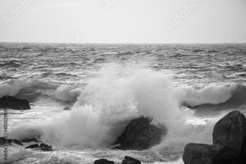 Ocean crashing onto a rocky shore