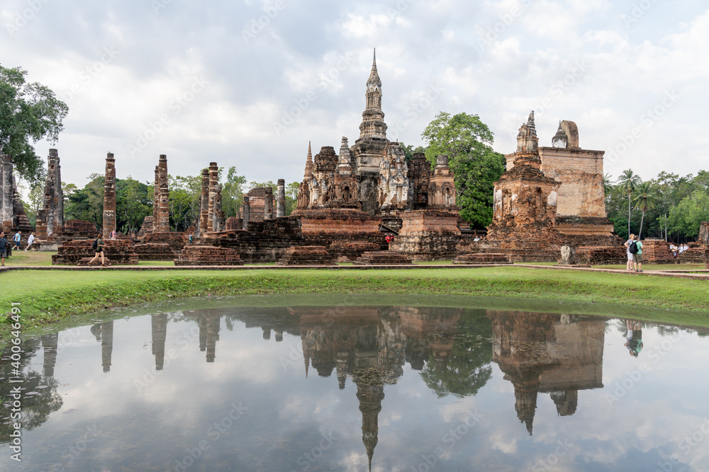 Sukhothai, Thailand - November 25, 2018: Sukhothai Historical Park in the morning in Thailand, The Sukhothai Historical Park ruins are one of Thailand's most impressive World Heritage Sites. Sukhothai, Thailand - November 25, 2018: Sukhothai Historical Park in the morning in Thailand, The Sukhothai Historical Park ruins are one of Thailand's most impressive World Heritage Sites.