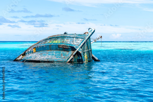 Shipwreck in Vaavu Atoll near Keyohoo Island, Maldives photo