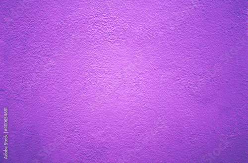 purple wall background and texture. purple background. purple cement or concrete wall texture for background. High resolution through process retouch. Painted concrete wall texture in pastel color.