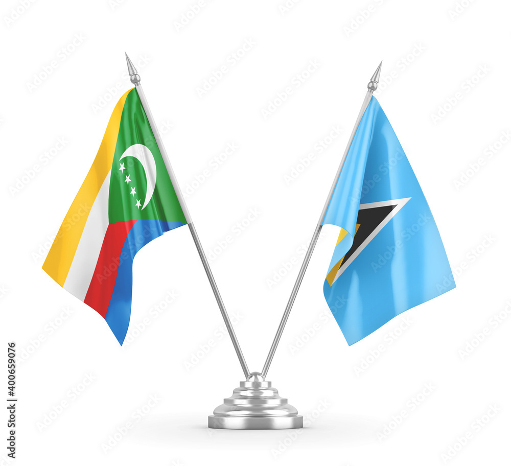 Saint Lucia and Comoros table flags isolated on white 3D rendering Saint Lucia and Comoros table flags isolated on white 3D rendering