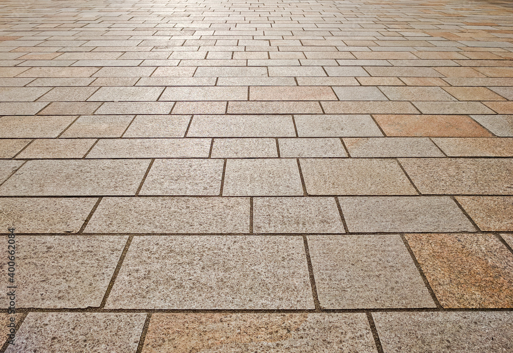 Low level perspective view of stone slab paving.