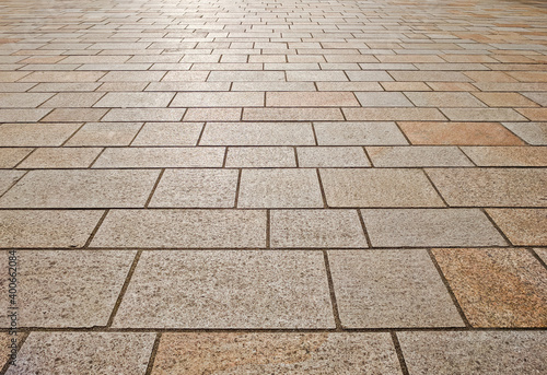 Low level perspective view of stone slab paving.