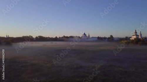 Orthodox church on the territory of the Suzdal Kremlin, aerial View, foggy morning, summertime. The Cathedral of the Nativity of the Theotokos.