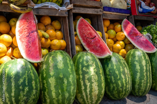 selling fruits and vegetables in a street market photo