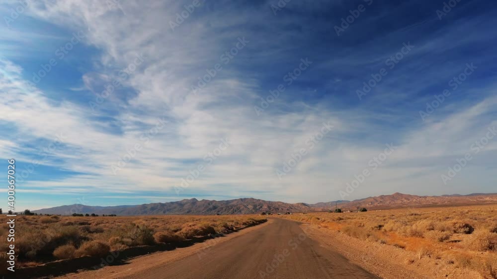 Hyperlapse Driving on Highway in Golden Brown Mojave Desert Landscape Hyperlapse Driving on Highway in Golden Brown Mojave Desert Landscape