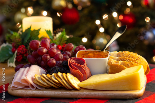 Grape, Cracker, Jam, Bread, Ham, Candle, Pine cone, Cheese to eat for Christmas