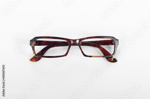 A close-up picture of a hawksbill turtle glasses frame on a white background