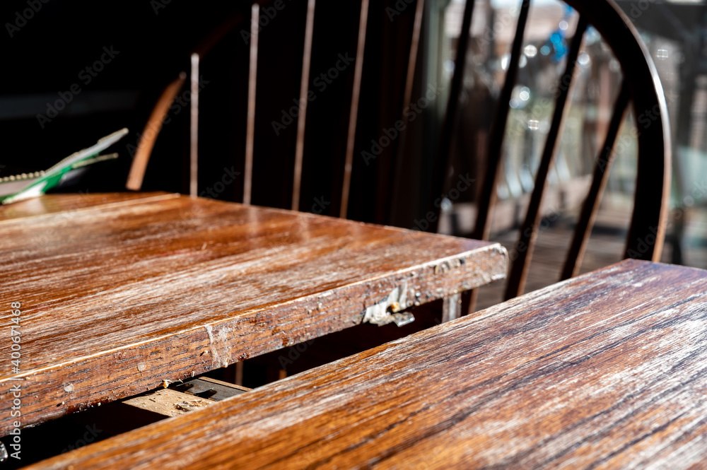 Fototapeta premium Selective focus on mechanism and gap for adding an additional leaf to an expandable kitchen table