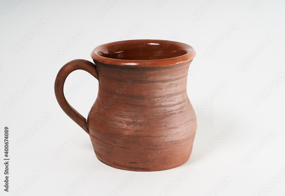 Pottery Craft, ceramic product with your own hands, made on a Potter's wheel, isolated on a white background.