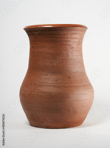 Pottery Craft, ceramic product with your own hands, made on a Potter's wheel, isolated on a white background.