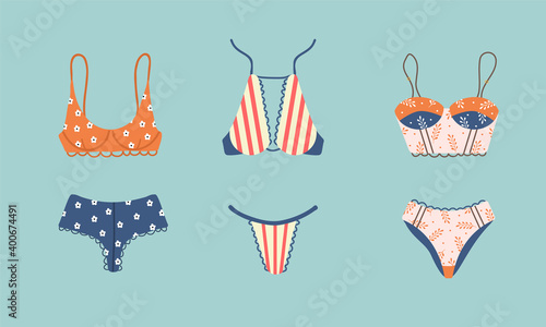 Modern female lingerie set. Trendy hand drawn underwear or swimwear. Panties, bikinis and brassieres. Vintage vector illustration in flat cartoon style.