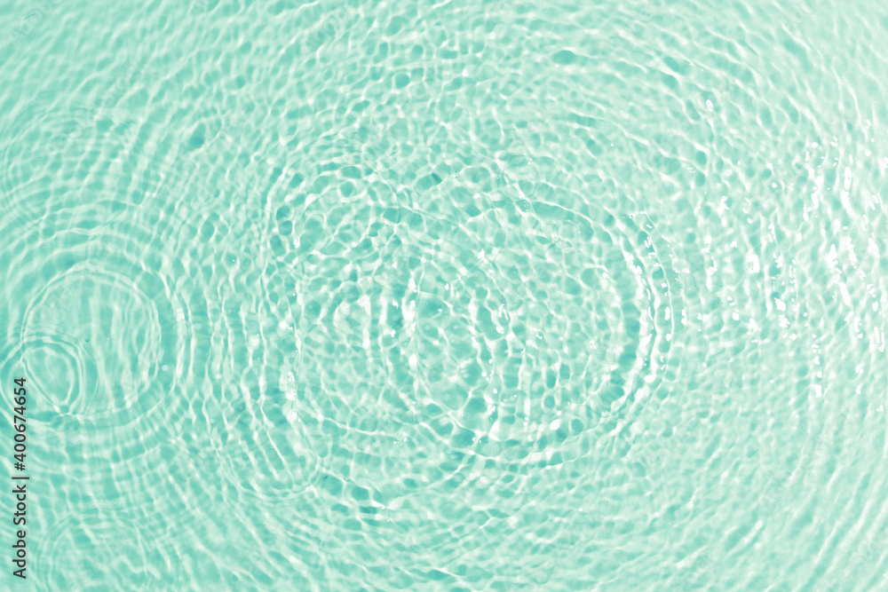 Fototapeta premium texture of splashing water on pastel background