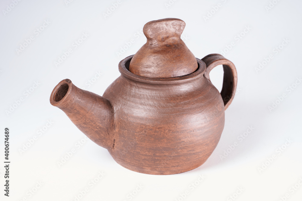 Pottery Craft, ceramic product with your own hands, made on a Potter's wheel, isolated on a white background. Pottery Craft, ceramic product with your own hands, made on a Potter's wheel, isolated on a white background.