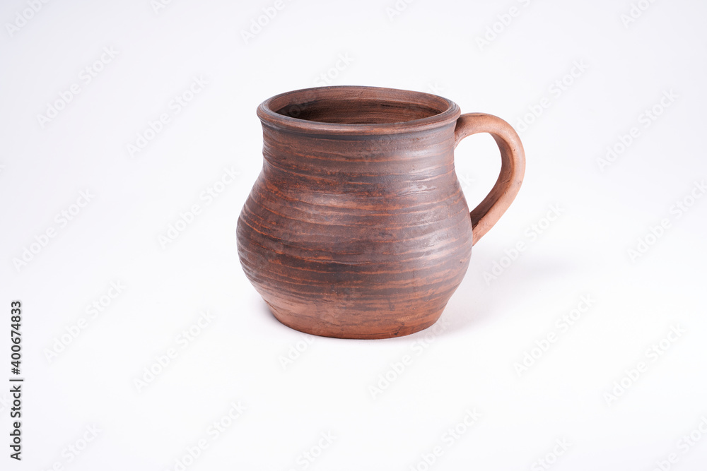 Pottery Craft, ceramic product with your own hands, made on a Potter's wheel, isolated on a white background.