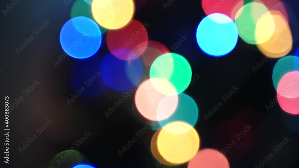 Christmas, blurred bokeh of Christmas lights on the Christmas tree, New Year. Christmas, blurred bokeh of Christmas lights on the Christmas tree, New Year.