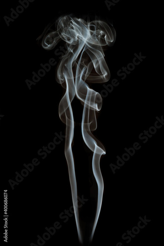 Abstract shape smoke in motion on a black background