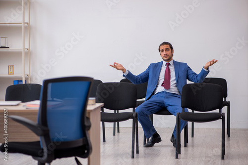 Young businessman making presentation during pandemic