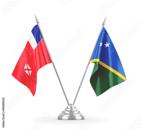 Solomon Islands and Wallis and Futuna table flags isolated on white 3D rendering photo