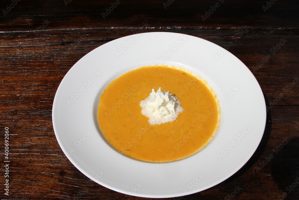 Carrot soup with whipped cream Carrot soup with whipped cream